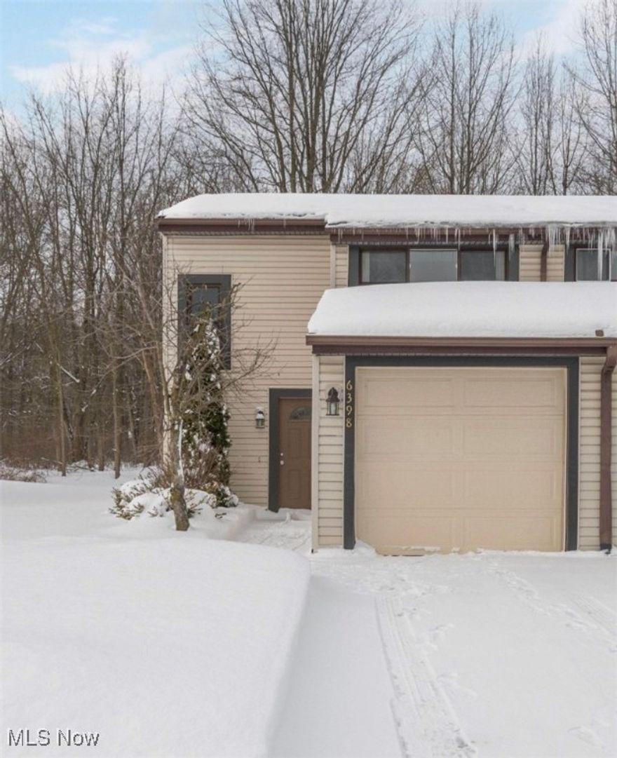 Welcome home to easy living! This spacious and updated condo offers the perfect blend of comfort and convenience. Step inside to find durable, newer LVT flooring throughout the entire first floor. The generous living room features a sliding door leading to your private patio—the perfect spot to relax and enjoy the serene, wooded views. The layout flows seamlessly into a good-sized dining area and a bright kitchen featuring ample counter space, newer cabinets and newer appliances. The attached garage leads into the convenient first-floor laundry room, which opens directly into the kitchen. 

Upstairs, you will find a tastefully updated full bath and three bedrooms, highlighted by a massive master bedroom that offers plenty of space for a king-sized bed and sitting area. Major peace-of-mind updates include new windows installed in 2020. Located just minutes from major highways, shopping, and dining. A great value and nothing to do but move in!