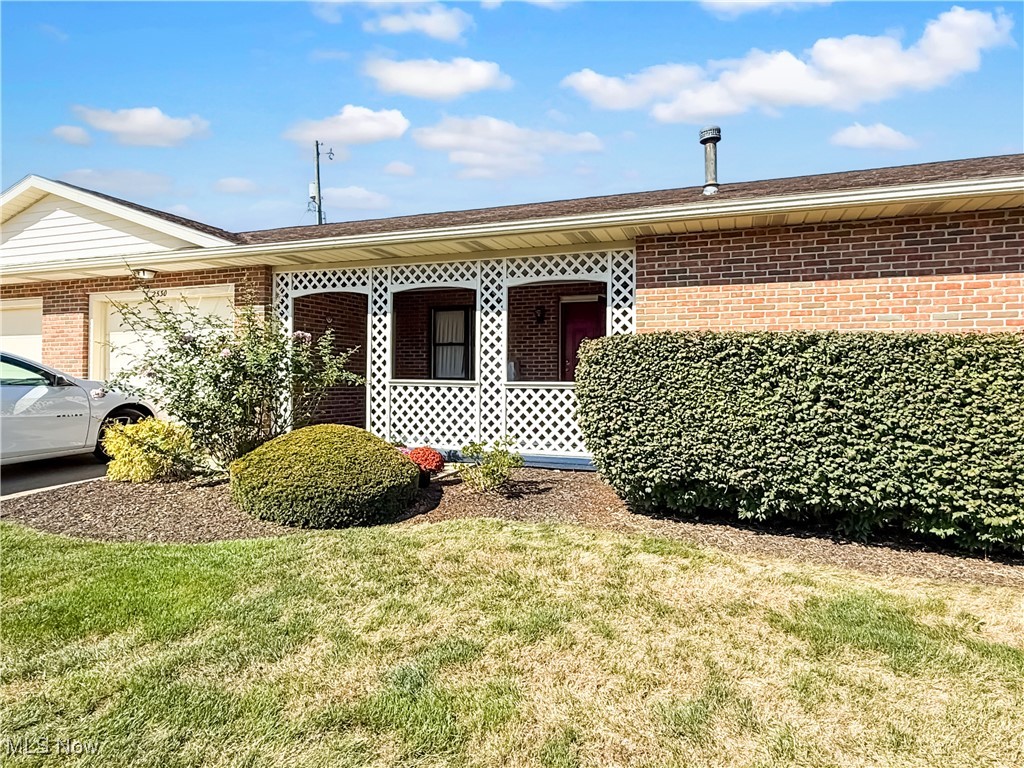Hidden gem in a small condominium complex. This open-concept home offers two bedrooms, one bath, a one-car attached garage, laundry room, kitchen, dining, and living room. Enjoy extra living space in the three-seasons room plus a large covered front porch and slab patio. Storage is easy with multiple closets and an oversized garage. Updates include new bedroom flooring and paint in 2025, a furnace cleaning in 2024, and a new microwave, dishwasher, washer, and dryer in 2024. Newer HVAC and water heater. Seller is offering a one-year home warranty. Condo HOA is $450/quarter.