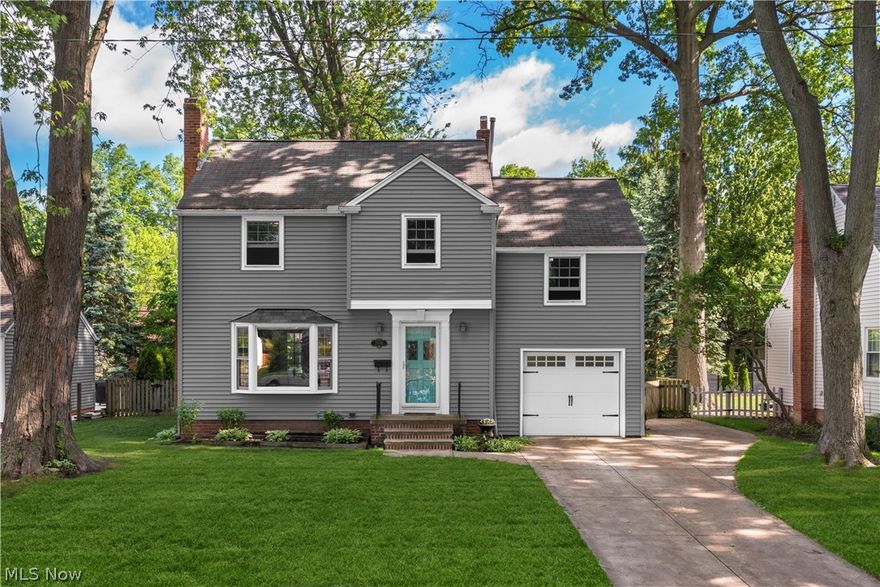 This bay village colonial is calling your name. Set in central bay on the highly desirable midland, this home is set up for success and ready for your touch. Home has been well maintained and loved. Lovely hardwood floors greet you upon entry and flow from living to dining room. The living room offers a lovely fireplace to sit around ,picture window beaming with natural light, and original built ins.Eat in Kitchen is off the dining room, featuring pantry, newer cabinets, appliances, counters, and backsplash. 1/2 bath complete the main level. Up the wood clad stairs you will find 4 bedrooms and 1 full bath. Spacious addition over the garage would make for a terrific master bedroom w dual closets. The 2nd bedroom features rooftop terrace access overlooking the mature landscape. Attic can be accessed thru bedroom 3 and grants loads of storage. Partially finished lower level , with new flooring and fresh paint, grants additional square footage, laundry, mechanical, and storage. The 3 seaso