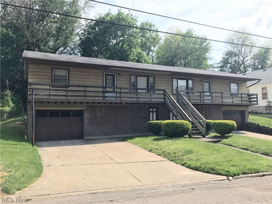 Side by side 2 unit with private basement and extra deep garages. 4' balcony with red wood decking. New windows 2017. 25 year shingles on roof in 2002, new H2O 2013. Lot size is 40x120. Always rented, original owner is selling off investment properties. Gross Income is based on potential income.  Seller is selling vacant as it is easier to show.