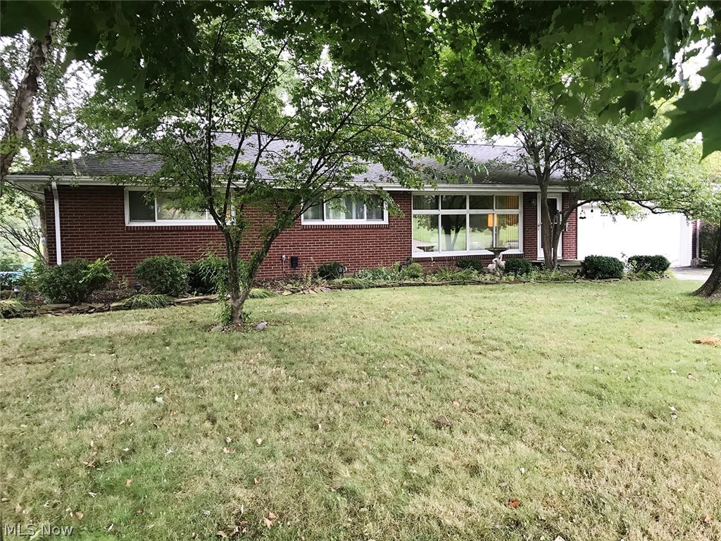 Main level having two car garage, open living room, foyer enterance, open dining room, kitchen, three bedrooms and a full bath. Nice open basement with modern gas furnace and central air. Home is on public water and public sewer. Blacktop driveway and nice treed backyard with storage shed. Shingles are a few years old. Nice clean home.