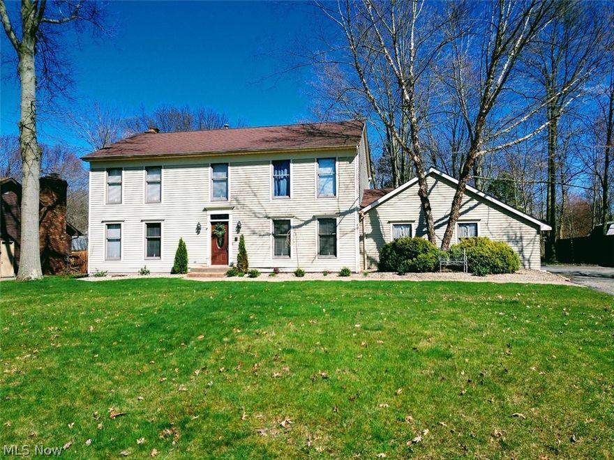 Very spacious colonial features 4 bedrooms, 3.5 baths, remodeled eat-in kitchen with center island, all appliances, ceramic backsplash and ceramic floor, sunken family room with whole wall brick fireplace, large dining room for entertaining, 2nd floor laundry room - washer & dryer included, partially finished basement and seller is offering a Home Warranty for a worry free purchase. Updates include: roof (2009), furnace (2003), kitchen (2016), 3 baths (2019), exterior doors (2014), new front landscaping (2019), new hot water tank (2019) and stamped concrete walkway in 2019.