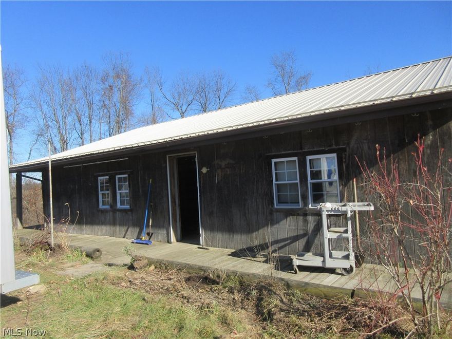 Homestead property makes a good hunting or getaway, or winery. Asparagus and herb garden. Peach, pear apple, cranberry, plus beech. 100 ft long row of grapes, 2 (15') rows of blueberries, 3 rows of big blackberries. red and black raspberries