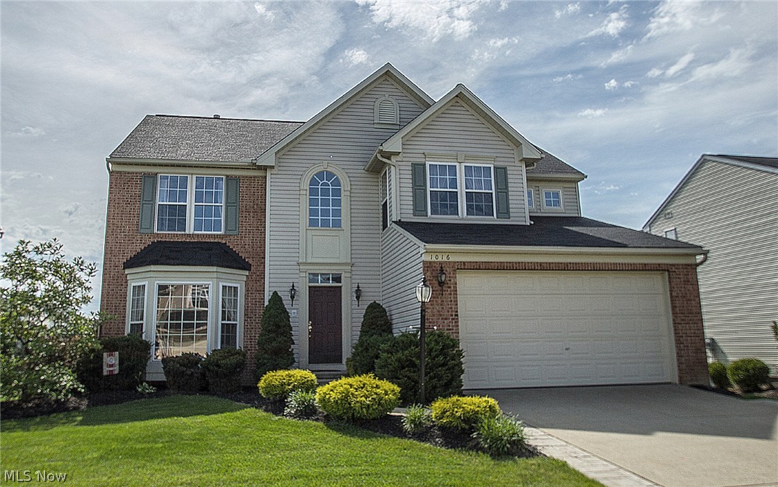 This gorgeous "Dunkirk" home shows like a model. It is spacious and is loaded with upgrades. The premium lot location overlooks the walking trail and playground area. Features include: upgraded 42 inch maple cabinets with crown molding, expanded kitchen island, large vaulted sunroom with huge arched window, newer bamboo wood flooring in foyer and kitchen, breath-taking lighting fixtures, tons of natural light, expanded family room features an additional 4 feet and extra windows, in-wall surround sound, finished garage walls, and driveway extension. A rough in for a full bath is located in the 1376 sqft of the basement, just waiting to be finished to your specifications. The master suite features sitting are, large walk-in closet, in suite private bathroom with shower, soaking tub, and double bowl vanity. The additional three bedrooms are on the second floor and all generous in size and closet space. End each day overlooking the park and relaxing on your maintenance free deck that ste