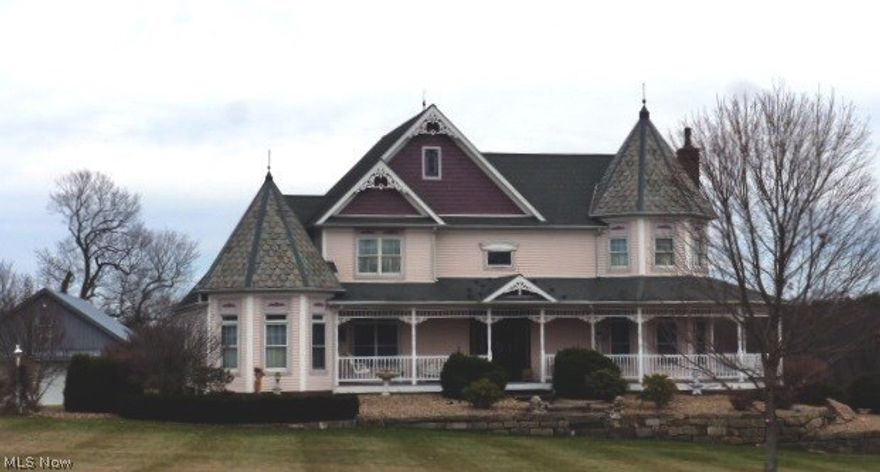 Country atmosphere dream home! Custom built Victorian Beauty resting on 26.5 acres! This spectacular home features a grand foyer entry, breathtaking great room with wood burning fireplace including 20 foot high ceiling, eye-appealing oversized kitchen with updated stainless steel appliances, granite counter tops, center island with access to the wraparound porch. First floor formal dining room and laundry room, abundance of custom hardwood floors and three ample sized second floor bedrooms with two full baths. First floor master bedroom features a one of a kind master bathroom including a Jacuzzi. Full basement has an additional fireplace, 80 gallon hot water tank, 12 coarse basement, and access to outside. Home has an attached triple car garage and a detached 6 car garage perfect for storage!