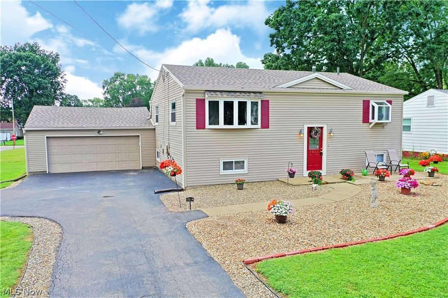 Don’t miss your chance at this phenomenal bi-level home, located on a prominent corner lot in a desirable Warren neighborhood! The sprawling layout include three, spacious upstairs bedrooms and a fully finished lower floor with three potential bonus rooms. Bringing tons of curb appeal to the table, its well-kept exterior includes tastefully sculpted rock beds and a bold, red front door that draws you near. Around back, the lush yard is enjoyed from a substantial rear patio and includes a storage shed. Inside and up the main stairway, a relaxing living room rises from the foyer, bringing natural light with its scenic bay windows. Opposite, the cozy kitchen includes eat-in dining while bight white cabinets pair with stainless appliances. The main hall offers a trio of main floor bedrooms, completed with a lavish full bath at hall’s end with custom tile work. Below, the bonus rooms include a current family room and two other finished rooms, ready to suit your taste and needs. Laundry and