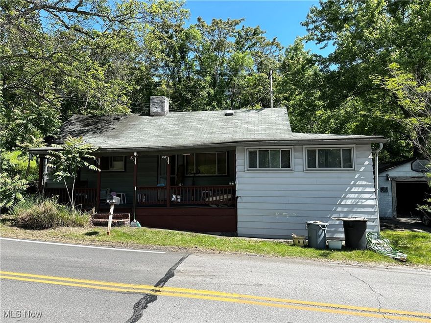 Discover a rare opportunity to own a piece of Ohio history. Per the owner, this charming 1-2 bedroom home was once a toll house along the historic Martins Ferry-Colerain Turnpike. In the mid 1800's, the Martins Ferry-Colerain Turnpike was a vital route for travelers, and toll houses like this one were strategically placed to collect fees for road maintenance. While it requires restoration, the home's rich heritage and prime location offer exceptional potential for the right buyer. With its historical charm, ample square footage at over 1300 sq. ft., public utilities, generous lot size and central location, this property is a diamond in the rough. Whether you're an investor looking to restore a piece of history or a homeowner seeking a unique project, this home offers endless possibilities. Being sold in as-is​​‌​​​​‌​‌​​​‌‌​​​‌‌‌​​‌​​‌‌​​​​ condition.