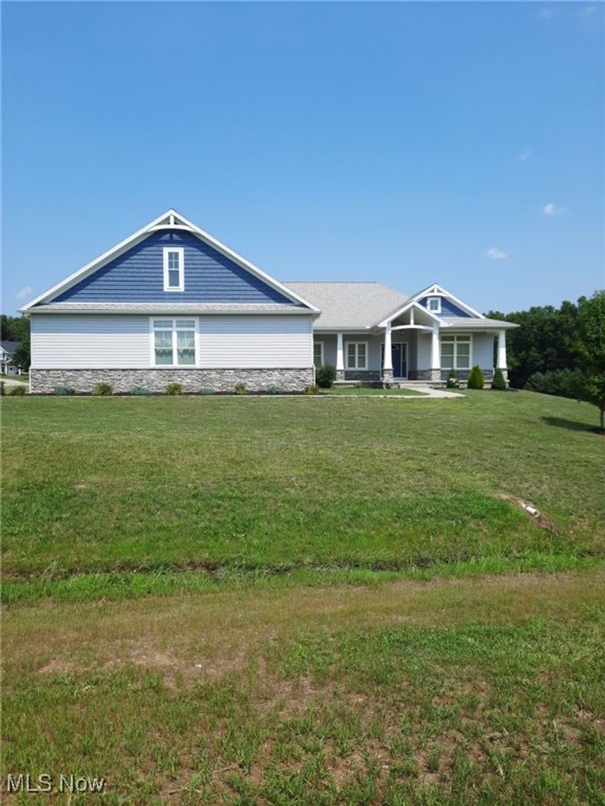 MOTIVATED SELLER: PRICE IS NEGOTIABLE A CHARIS ENERGY EFFICIENT CUSTOM BUILT HOME (low utilities, continuous air exchange system supported by energy efficiency tests and ICF Block construction) Located in a Quiet Randolph Neighborhood Six miles South of the Northeast Ohio University College of Medicine (NEOMED) includes 3 Bedrooms, (which includes Two Master Bedrooms with walk in closets) 3.5 Bathrooms Ranch Style House on 1.86 acres, built in 2018. Open concept floor plan with tray ceilings. Large living area with fireplace. Hallways adorned with pillar entry and transom windows. Ceilings are 10ft. and 9 ft. throughout. Large kitchen island with quartz countertops, oversized pantry, Laundry room with sink, quartz countertops, closet, washer and dryer. CORETEC Premium vinyl floors (which is waterproof, pet proof & kid proof) in all rooms. Master bathrooms have tile floors and quartz countertops Bonus room could be used as office/den or bedroom on first floor. Private living quarters in finished basement with separate entrance through the garage. Basement has large bedroom double closets, full bathroom with shower, additional room with cupboards and sink could be used as kitchen. Comfortable accommodations for extended family or out of town guests. Several storage areas. Large oversized 3 car garage with room for small boat, golf cart or ATV. Enclosed Patio with fireplace. Old Mill Run Home Owners’ Association (HOA)---2,432 sq ft. Additional approximate 2,000 sq ft in finished basement. Well & Septic.