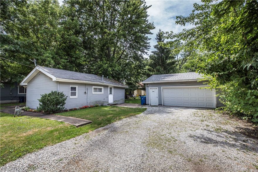 WHAT A LITTLE GEM IN THE HEART OF LAKEMORE! Welcome home to 1424 4th Street in Lakemore/Springfield Schools. This cozy residence offers ALL FIRST FLOOR LIVING. The home includes roughly 900 square feet, two bedrooms, and one full bath. First floor is open, kitchen adjoining the living room space, two bedrooms tucked away and office space on other side of the home. First floor laundry located off the kitchen. Detached two car garage. All within minutes of Springfield Lake & Village of Lakemore.  This property is a handy man special, hence the price. Call/text for your private showing.