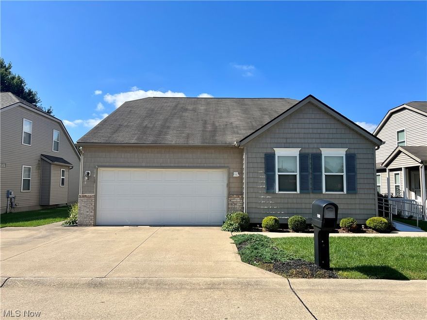 Welcome Home to this beautiful 55+ community, free-standing Condo with convenient FIRST FLOOR living!  This lovely home offers an open concept kitchen that includes all appliances with attached laundry and large pantry closet.  The spacious living room features vaulted ceilings, gas fireplace and large windows providing pleasant views and an abundance of natural light.  The dining room is perfect for entertaining, located between the kitchen and entryway with newer laminate wood flooring throughout.  Primary bedroom with walk-in closet and en-suite can also be found on the main floor, along with a second bedroom and full bath.  Third bedroom and bath found upstairs adds to the possibilities of guests, office space, crafts, etc.  Tons of additional storage can be found in the downstairs crawlspace.  Two car-attached garage.  Great location!