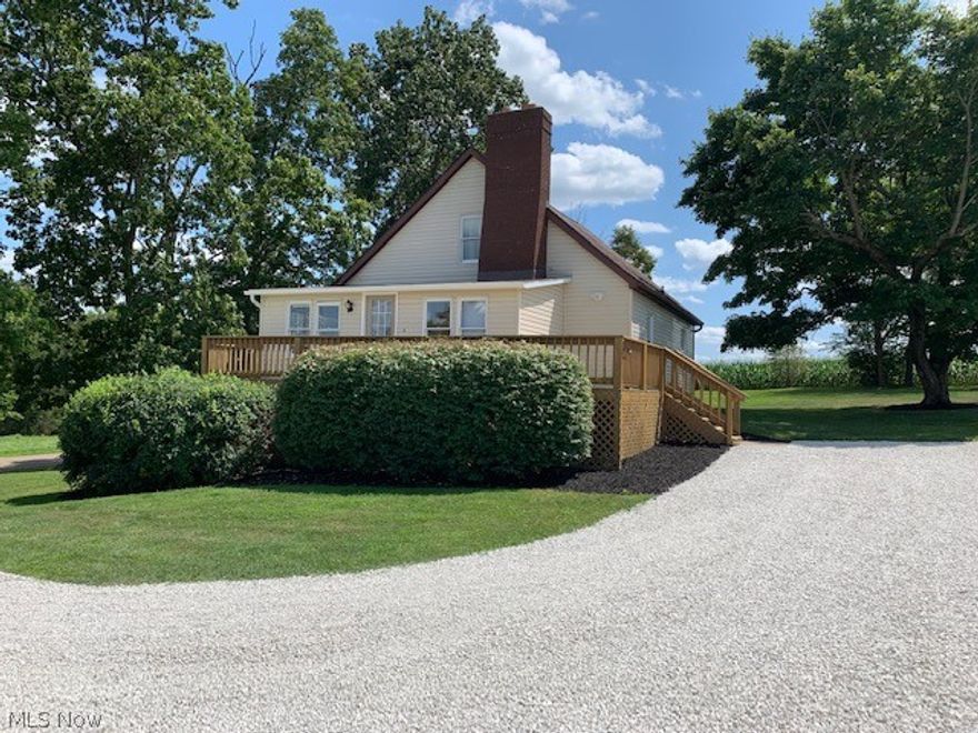 Adorable, updated home in a country setting on one acre. Home has been totally and beautifully redone. Walk into the sunroom with beautiful hardwood floors with oak trim to the living room that has cathedral ceilings with fireplace and is open to the upstairs loft. This home offers a first floor master bedroom with private bath and walk-in closet and first floor laundry. Large kitchen with new flooring and plenty of cabinet space. Upstairs is a bedroom, full bath and loft area ideal for play room or office. Walk-out basement that could be finished for additional living area. 28X30 heated detached garage with shelving and cabinets for storage. All appliances will stay. Convenient location and only minutes to Atwood Lake. A one-year warranty is being provided to the new owner. Call today to view!!