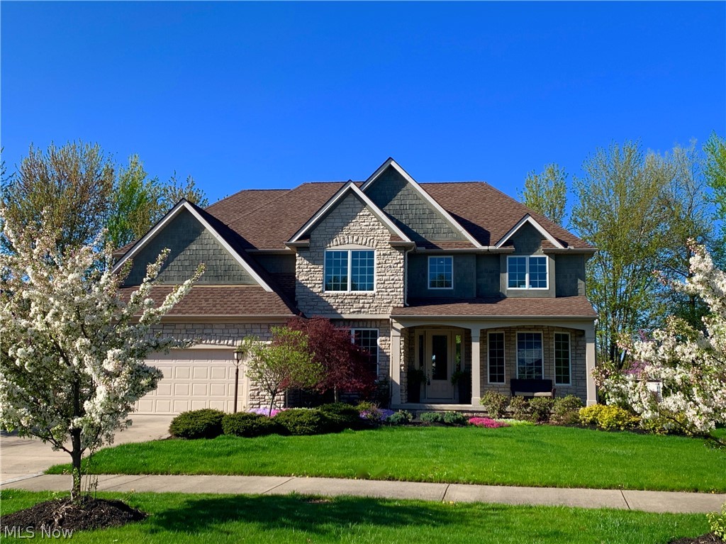 You won't believe your eyes! Updated 4 bedroom, 2.5 bath, 3 car garage, Full finished basement & almost 3,000 square feet of open Living space w/all the bells & whistles! Two story grate rm w/wall of windows, fireplace, huge kitchen, & upgrades galore. All in Red Tail's Premier Private Golf Club, available now for under market value. Shows like new construction. Every room in the home has been freshly painted from yellow-beige to todays soft, neutral colors. All wooden trim, moldings, doors, railings, painted from wood to builder's white. Every hinge, handle, replaced to brushed nickel. Every switch, cover plate & outlet changed out to modern code & color. New fixtures. Upstairs carpet & grate room carpet replaced. Hardwood floors. 3 car tandem garage w/designated outlet for generator or golf cart. Private back yard w/new oversized stamped concrete patio (2018). Quality built home w/large front porch, located in the heart of Avon. Minutes to Avon Commons, Crocker Park & Highway access.