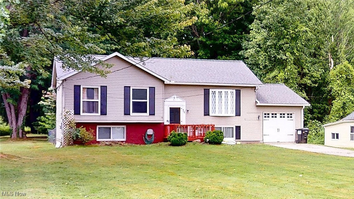 This 4 Bed with a bath and a half has what you're looking for! The unique design in the Bi-Level has three bedrooms on
the ground level and 2 Bedroom up. And a light filled office. The Kitchen features plenty of storage and cook top space
for your entertaining needs with with door to outdoor deck. Dining room and living room have an open concept with
lots of natural light Vinyl and Laminate flooring throughout the top floor and newly installed on the entire first level
will make your cleaning a breeze. The ground level features 3 bedrooms as well as the laundry end mudroom off the
garage. You'll love the backyard for your fall cookouts and relaxation. Newer septic (1/21) and roof (5/21). Close to
schools and shopping!