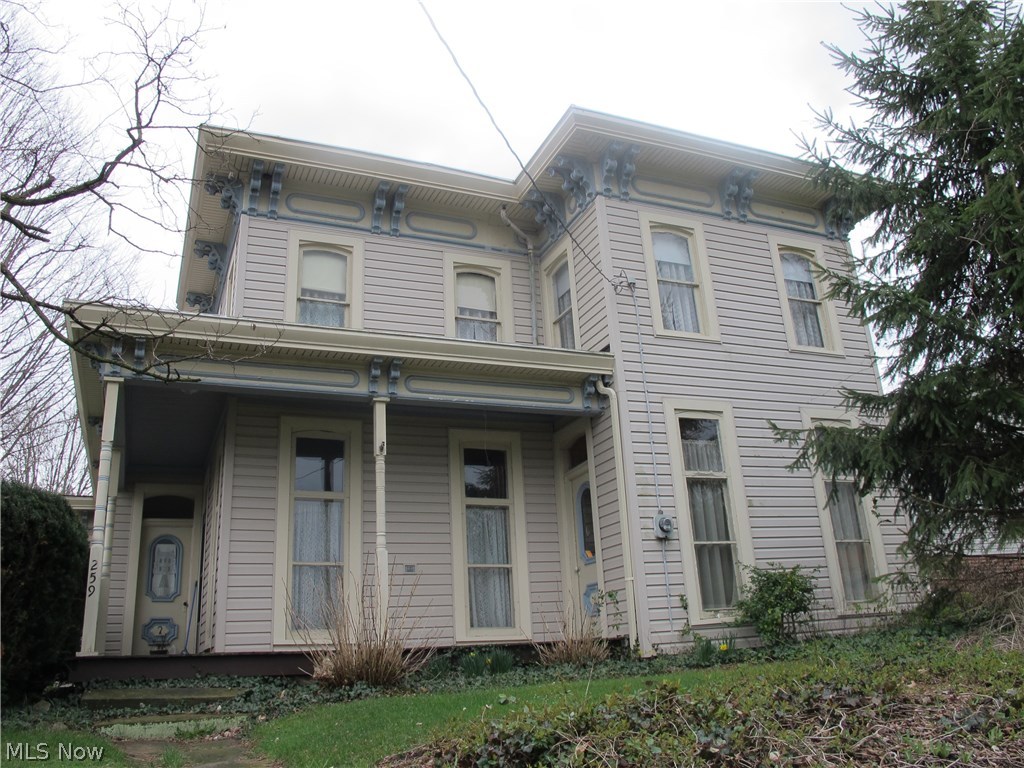 Old world charming home with living room plus parlor. Updated kitchen and dining room. This home has outstanding sculptured wood work through out! Vinyl siding, 1 car garage, vinyl fence.