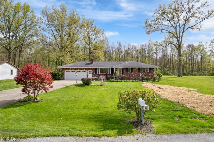 Welcome to 3155 Weilacher Rd, a lovingly maintained, one-owner ranch offering the perfect blend of comfort, privacy, and country charm. Set on a beautiful 100’ x 187’ wooded lot with a vacant parcel to the west and additional rear right-of-way space that makes the property feel even larger, this home delivers a peaceful rural-neighborhood setting buyers will love.

Inside, a foyer opens to an impressive 25’ x 12’ living room anchored by a striking stone-accent fireplace. The dining room features an elegant chandelier and overlooks the wooded backyard, creating a warm and inviting place to gather. All three bedrooms feature hardwood floors, and the owner’s suite includes its own convenient half bath.

The partially finished basement adds incredible value with an expansive 39’ x 20’ recreation room, a second wood-burning fireplace with a brick accent wall creating an ideal space for entertaining, hobbies, game nights, or future finishing potential.

Outside, enjoy a flat wooded yard, welcoming front porch, large 2-car attached garage, and a steel barn with concrete floor and electricity which is perfect for storage, workshop space, equipment, or small hobby-farm possibilities.

Major updates include a 2016 heat pump for heating and cooling, new electric circuit breaker panels in 2024, plus a new septic system, well pump, and pressure tank in 2025. Move-in ready with room to make it your own, this is the kind of home that offers space, character, privacy, and long-term value, all in the Labrae School District.  Agent is related to the seller.
