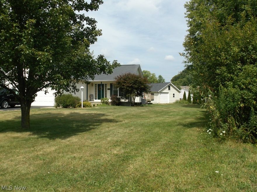 Don't miss this one!!  3-Bedroom 2 full bath ranch w/vaulted ceilings and gas f/p in Living Room.  Master has full bath and garden tub sep shower and walk-in closet.  The 30x16 finished rec-room is great for entertaining.  Sliding glass doors off kitchen leads to quaint deck.  This home also boasts additional 20x30 concrete floored garage w/2 man doors for your toys.  Stop to see this beauty.  Make Offer!!