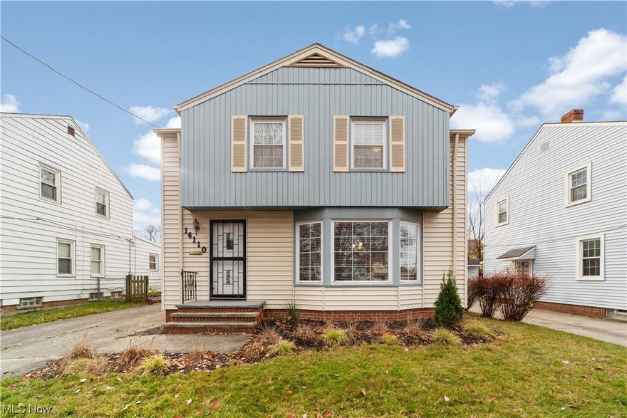 Step inside this captivating colonial in Cleveland! This delightful home features 2,011 square feet with 3 bedrooms, 1.5 bathrooms, updated living spaces, a beautifully renovated kitchen, and more! The front door opens into a welcoming foyer that opens into an inviting living room. Here you will find an elegant fireplace with a tile surround, built-in shelves, and a bay window that fills that space with sunlight. The living room is open to a generous dining room with a built-in corner cabinet. The dining room  flows into the beautifully updated kitchen that features a full complement of stainless steel appliances, delightful tile backsplash, and granite countertops. ALL appliances convey with the home including washer/dryer on lower level. Towards the back of the home is a spacious family room with ample windows, a modern wood stove, and french doors that open to the back deck. A lovely half bath completes the first floor. Upstairs are three bedrooms and an updated full bathroom with a tile shower surround. The lower level features a laundry / utility room and ample room for storage. Outside is a deep backyard, a two-car garage, and a lovely back deck. Conveniently located less than 5 minutes from two supermarkets, 10 minutes to the Van Aken Shopping District, Garfield Park Reservation, and Cleveland Memorial Gardens, and 20 minutes to downtown, the Cleveland Clinic Main Campus, and University Hospital.