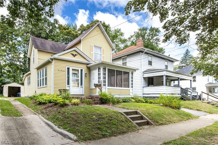 This charming colonial home is located in the sought-after Highland Square! Entering the grand foyer, you will notice the beautiful woodwork, refinished hardwood floors, and new lighting.  The living room has large windows to bring in plenty of natural light, and it opens up to the dining room.   The updated kitchen offers a walk-in pantry.  Off of the kitchen is a mudroom that leads to the backyard and garage.  Finishing off the first floor is a fantastic cosy feeling sunroom.  The second floor has two bedrooms with hardwood floors.  The main bath has been updated with new LVT flooring and lighting.  Additional updates: several windows, refinished dining room ceiling, landscaping, new wood moulding, and hot water tank. Part of the Firestone Community Learning Center & has a convenient location for freeways, downtown Akron, Akron University, parks, library, shopping, restaurants and the fun Highland Square festivals.  Check out 1000 Jefferson because there is nothing to do but move in and enjoy!!!