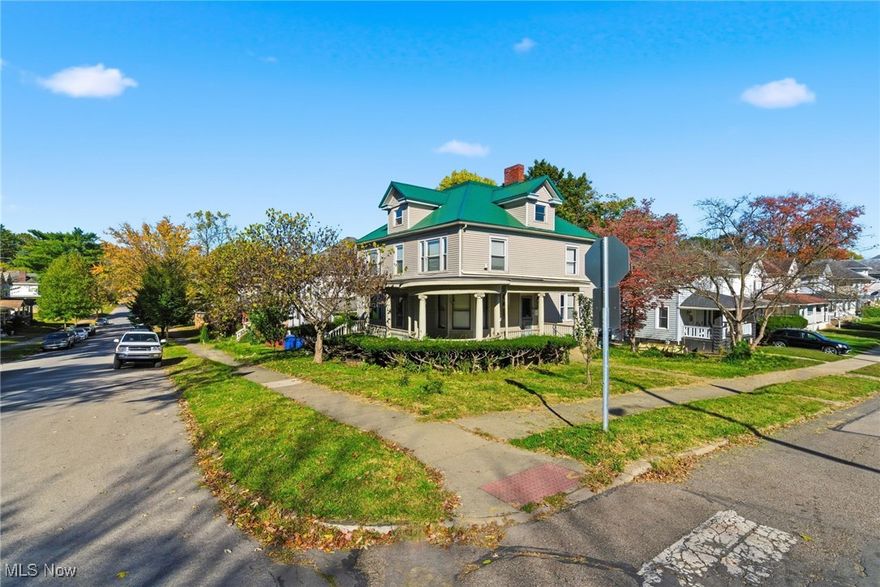 Great opportunity for investors.  3 levels of living space to create your own dream home or multi family living.   It is a Cambridge landmark with timeless character.  Located on a corner lot.  From the moment you arrive, the home makes a statement.  Wraparound porch that is supported by stately columns.  Step inside the grand foyer and you will be greeted with mahogany woodwork, polished hardwood floors and soaring ceilings that recall the bygone era of craftsmanship.  4/5 bedrooms. Original stained-glass windows cast jewel toned colors throughout.  The grand staircase , paired with the rare servant's staircase, reflects both the prestige and practicality of its time.  Updates include new metal roof in 2023, fully applianced kitchen and updated electric with outlets in every room.  First and second floor laundry hookups (washer and dryer stay).  The option of a first floor bedroom balances convenience and character.  The extra third floor finished attic is limited only by your imagination.  Its truly an amazing space with 2 dormers adding natural light.  This home was designed to be admired, not just lived in and is an important piece of Cambridge history.