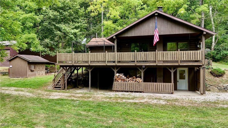 Your Private Oasis on 11 Acres Near Clendening Lake!

Dreaming of a secluded getaway and or home? This stunning home, just 8 miles from Clendening Lake, is your perfect escape! Nestled on approximately 11 acres of land, this property offers the ultimate in privacy and tranquility. Inside, you’ll find 2 bedrooms (with potential for a third), 2 spacious full baths, and an open-concept kitchen and living area featuring breathtaking cathedral ceilings. Freshly painted interior walls add a crisp, modern feel, and first-floor laundry ensures convenience.

But that’s just the beginning! This property boasts a long, private driveway, a wrap-around deck with a partially covered porch for those relaxing evenings, a new whole-house generator to keep you powered up, a cozy wood burner for those chilly nights, plenty of outdoor storage sheds, and a massive 36x56 detached garage with towering 18-foot ceilings with electric and water —perfect for all your toys and tools.

For nature lovers and hunters, the surrounding land is ideal, complete with pre-established food plots.

This is not just a home; it’s a sanctuary of peace and tranquility. Don’t miss out on this rare opportunity!