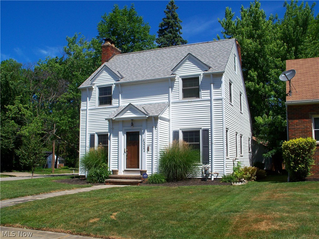 An absolutely lovely property located in a much desired area of Parma Hts. Built in 1932, the home offers a ton of old world charm - hardwood floors throughout, beautiful natural woodwork, built-in cabinetry, arched thresholds & high ceilings, foyer with guest closet & original ceramic tile, French doors to enclosed sunroom, split staircase and generously sized rooms. The living room features a beautiful wood burning fireplace and access to the sunroom. The formal dining room is located just off the remodeled kitchen. Granite counters, tons of storage, under cabinet and recessed lighting, plus a farmhouse sink are just some of the improvements which make this such an outstanding feature of the home. The main floor guest bath is situated off the kitchen by the back door. Upstairs there are three nice size bedrooms and a full bath with original subway tile and flooring. The unfinished attic offers great potential for additional living space. A nice laundry area, storage room, additional