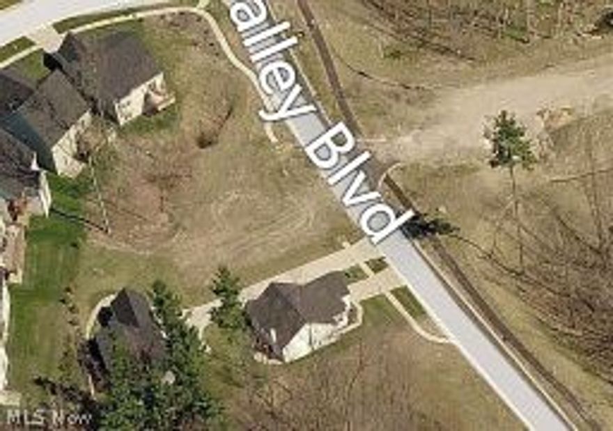 Beautiful gated community in North Royalton. Caters to SS+ cluhouse, pool, bocce & tennis courts, walking trails, exercise room & more! HOA provides now plowing, trash removal and landscaping. Build a new home for the nex phase of your life! Additional lot available.