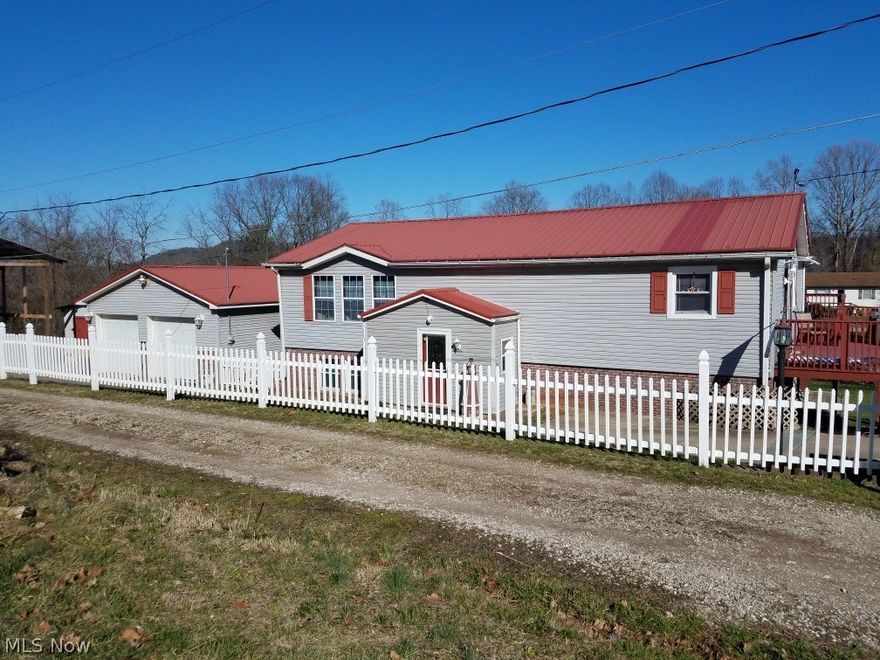 Newly Updated Bi-Level located just outside City Limits of Saint Albans, WV On Dead End Street.
Main Level Features Open Kitchen & Dining Room, Living Room, Master Bedroom Suite with Full Bath, 2 Bedrooms and 2nd Full Bath.
Lower Level includes Family Room, Game Room, Laundry Room, 2 Bedrooms and 3rd Full Bath.
Walk Out Lower Level has Sun Porch with Hot Tub and Above Ground Swimming Pool in Large Backyard.
2 Car Detached Garage - 2 Storage Buildings - RV/Boat Carport.

Listing Agent is related to the Seller.