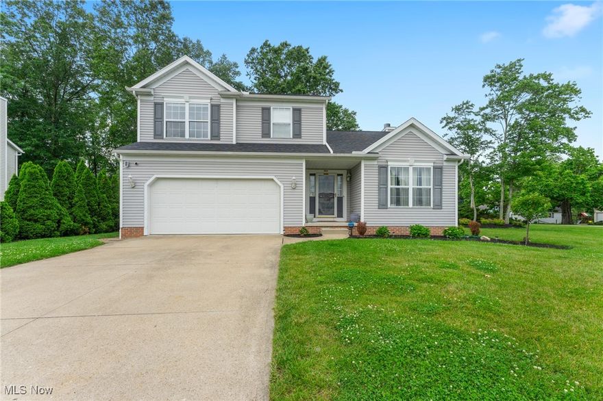 Tons of space and all the updates. Why keep looking? Situated in a beautiful neighborhood, this home has it all. The main floor consists of all new flooring and an open concept from the kitchen through the dining area and into the large main living space with a gas stone fireplace as the focal point. Also on the main level is a private office area, the half bath, and the laundry room tucked away.  The three bedrooms upstairs have all brand new carpet. The owner's suite comes with two separated vanities, a walk in closet, and large bathtub separate from the stand up shower. Outside you will find a freshly redone deck, grill pad, and fully privacy fenced in yard. Other updates include the roof, central air, and furnace all done the tail end of 2022. Don't pass this one up!