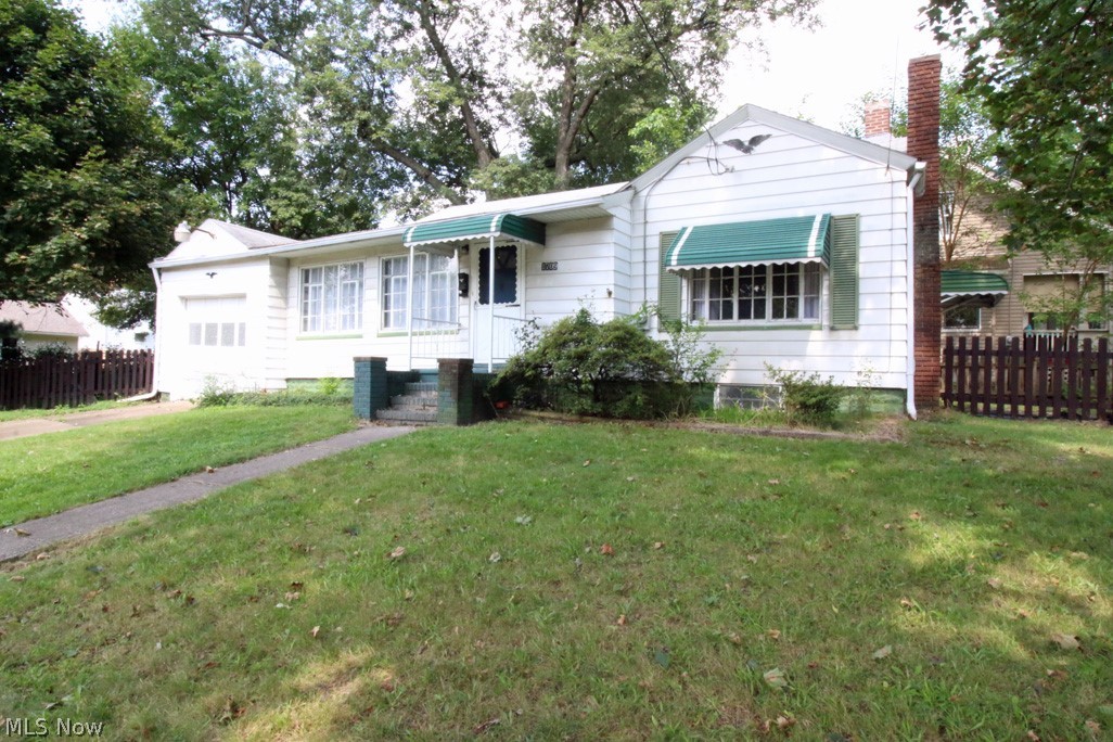 Cute ranch on a treed fenced lot. Enclosed front porch is a great place to relax and enjoy the view of the outdoors. The kitchen floor was recently replaced with LVT flooring in neutral gray tones. Recently painted interior. Carpets have been professionally cleaned. Fenced backyard. 1 car attached garage.