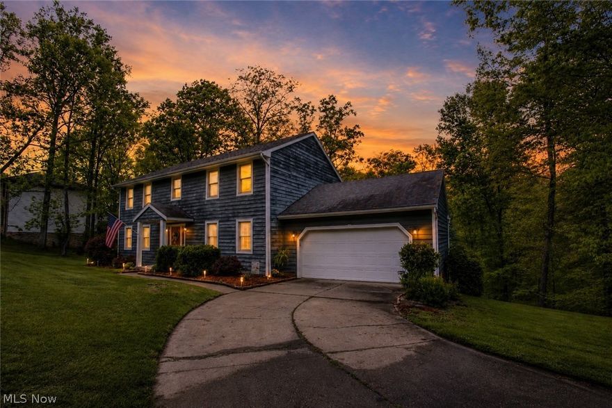 NEW CARPET & NEW PRICE! Are you craving quiet and solitude? Take a drive out Old St. Mary’s Pike and you’ll discover a subdivision you may have never seen before. Tucked away at the very end of a peaceful cul-de-sac in the hidden gem of Oakwood Estates, this 4-bedroom, 2.5-bath colonial offers the kind of privacy and tranquility that’s hard to come by...and yet, you’re still just 10 minutes from town. Imagine waking up to the sound of birds instead of traffic, sipping your morning coffee on one of the two back decks while looking out over your own private slice of woods. Life here feels like a weekend getaway...every single day. Inside, the home offers a warm and versatile layout. The spacious living room flows into a formal sitting area, perfect for a cozy reading nook, playroom, or dedicated home office. The kitchen is light and bright with crisp white cabinetry, granite countertops, and stainless steel appliances. Host holiday dinners in the formal dining room and and there’s more space in the finished basement for movie nights, game day, or for guests. Also in the basement, you’ll find a workshop room that’s perfect for hobbies or projects. Upstairs, the generous owner’s suite is your personal retreat, complete with its own private bathroom and a WALK IN closet. Three additional bedrooms offer space to grow, welcome guests, or create whatever your lifestyle calls for. A two-car attached garage, main-level laundry, and updated roof and HVAC (both replaced within the last 10 years) make daily living comfortable and convenient. If you’re looking for a peaceful place to put down roots or a quiet escape from the bustle of everyday life, 151 Granada Circle is the home for you. This home qualifies for FHA, USDA, VA, Conventional, and cash financing and is available for immediate possession.