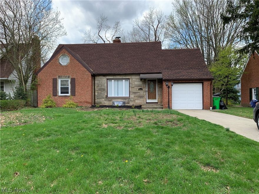 Spacious brick ranch in park-like setting in Euclid. Two bedrooms on first floor and large main bedroom on 2nd floor with plenty of closet space. Beautifully restored full bath with tiled floor and shower/bath surround. Updated kitchen with granite counters, Mosaic tile backsplash, natural wood cabinets, and newer stainless steel appliances!! Newer furnace and AC unit. Private back yard with spacious deck. Finished recreation room with half bath in basement. Ready to move-in. Violation Free.