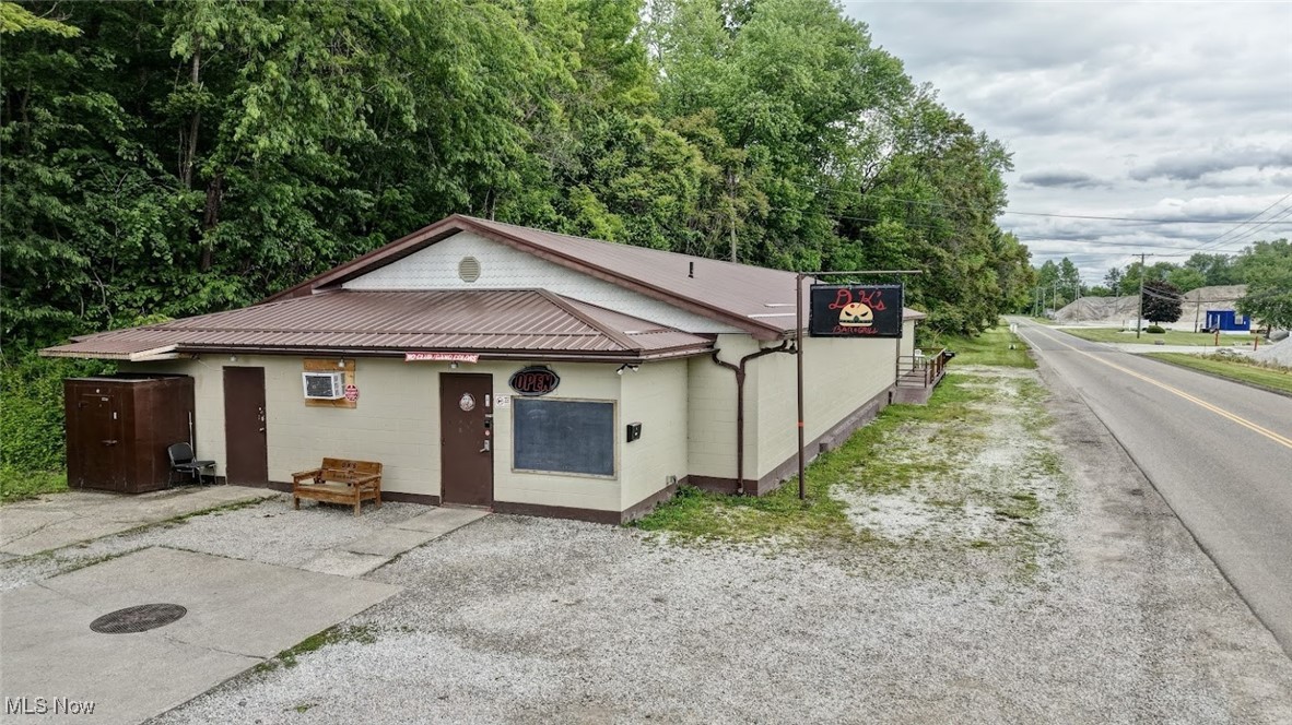 Here is your opportunity to own a piece of history in T-County. This turnkey bar and grill is being offered with a 4250 sq. ft. building on .66 acres; the business fully furnished with tables and chairs-bar stools-TV’s-food and alcohol inventory, also with a D5 liquor license. Seller has made many improvements since owning, new floors, kitchen refrigerator, kitchen stainless steel prep tables-deep fryer-new exhaust-, a/c in 2024 and furnace 2023, new roof, walk-in 10 x 12 freezer has new walls and ceiling; painted exterior. Full menu and Thursday is wing night. The back garage door opens to a back deck or have your favorite live band play. Property is zoned restaurant. Free Wi-Fit. Come in and play pool, juke box, slot machines or try your luck on the punching bag. There is a storage room and an office. Outside in front there is a freezer (just needs hooked up). Men and women’s bathrooms. Preapproved buyers please. A breakdown of financials is available for interested buyers with NDA signed. Business is currently open; M-T-W-TH 5:00 pm. To 2:30 a.m.; F-S-S 11:00 a.m. to 2:30 p.m. All showings must be during non-business hours.