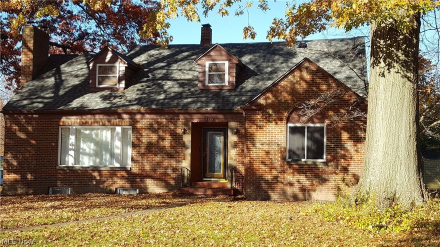 Come home to this warm and inviting 5 bed brick Cape. Enter thru the beautiful glass front door to the large-open foyer.  Sit down and relax in the spacious LR with WBF, HW floors and large (new) picture window.  The eat-in kitchen is a chefs dream w/ bakers nook, pantry, granite countertops, large subway tiled walls and SS appliances.  After a long day, relax in one of the 2 updated full baths-both on the main level.  The upper floor has 2 large bedrooms with a meeting area for family game night or to watch football.  We have a full basement w/wet bar, wbf, Partial finished.  The other side has a large laundry room, 1/2 bath and pool table (which stays).  Back room for canning or craft.  Updates:  2 main floor full bathrooms, hardwood floors, kitchen.  Newer (w/i 2 years):  SS appliances, furnace, a/c, windows.  Bonus room could be converted into a first floor laundry.  Stop by, take a look.  Fall in love and make this your next home.  Home sold "AS-IS", Seller will make NO repairs