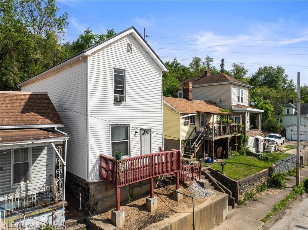 Photo of 715 N Zane Highway, Martins Ferry, OH 43935 (MLS # 5207837)