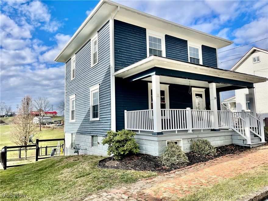 Charming 3 Bedrooms, 2 Full bath home with original wood trim and replacement windows.   9 foot ceilings on the main floor and tons of character. The rear yard is fenced with a large shed type barn with attached stable for your small animal.  The large front porch invites you to relax after a long day. Windows, furnace, AC, hot water tank and porch all 2015. Stainless kitchen appliances. Full bath/ laundry on the main floor plus full bath upstairs. All of this just and easy walking distance to downtown and on a dead end street.
