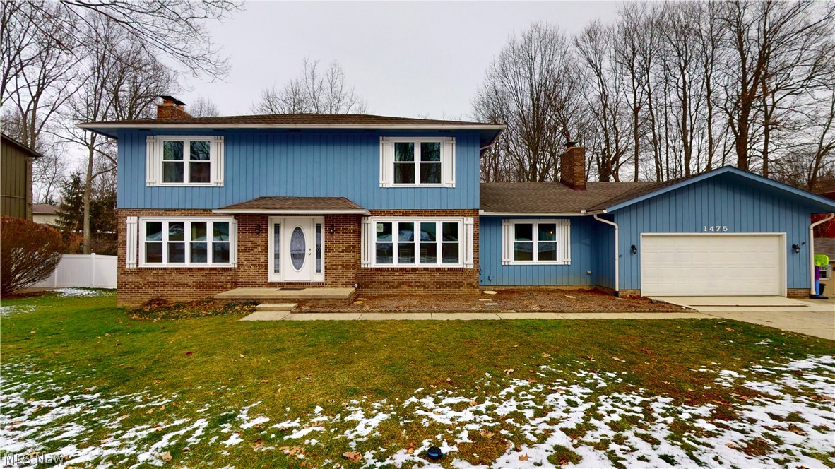 Welcome to this beautiful 4-bedroom 2.5-bathroom colonial in Stow! You will not be disappointed with the living space, offering over 2700 sq. feet! Enter the gracious foyer with a curved staircase up to the second floor. You can then walk straight into the kitchen or into the living room with a beautiful brick fireplace. Do not forget about the separate family room with vaulted ceilings, another secondary fireplace, and a sliding door leading to the spacious back porch. Enjoy evenings overlooking the beautiful, wooded landscape in the backyard! Master bedroom is a great size with tons of closet space and a full master bath. There are 3 more generously sized bedrooms for your growing family. The unfinished walkout basement offers endless opportunities. Newly Paved garage floor and drain (2019), New Furnace & A/C (2018), New Hot Water Tank (2018), New windows (2019), All new toilets (2019). Do not miss out on this opportunity to call this home.