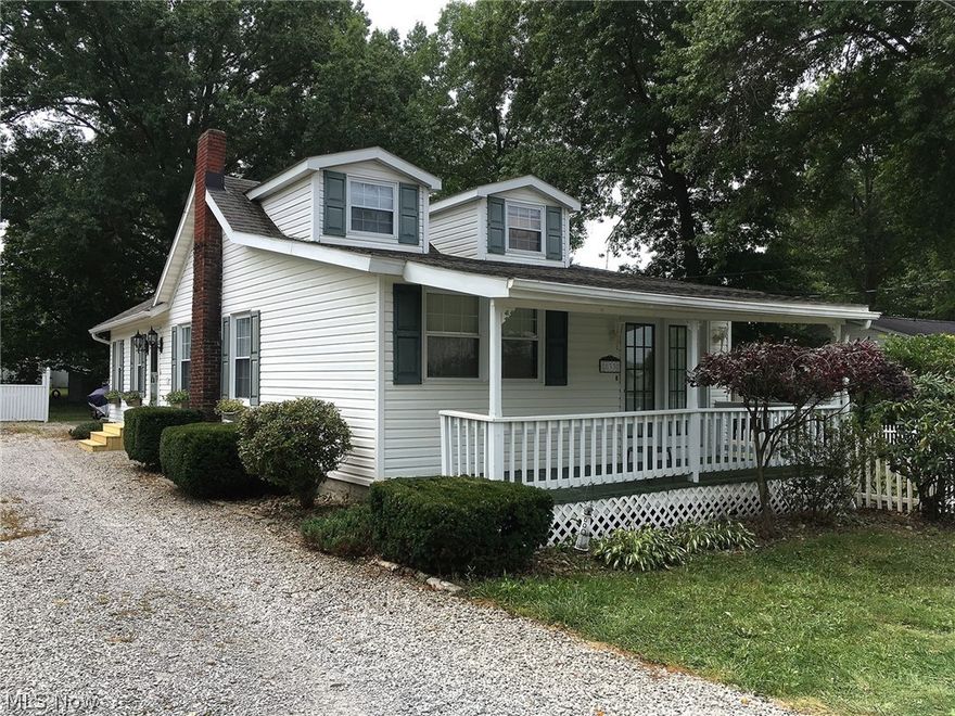 LAKE LIVING at its best! Beautiful Lake Milton water views from almost every room of this year-round extensively remodeled home. Features include beautiful SHAW wood flooring throughout, CENTRAL AIR conditioning, ceramic tile, vaulted ceilings, Certainteed windows, new storm door and entrance steps along with the benefits of public water and public sewer. This light, bright and airy space with lots of natural light is conveniently located close to I-76 in a quiet neighborhood. Offering affordable home living with first floor laundry and an extra large cook's kitchen with built-in breakfast bar, the stove, refrigerator, dishwasher and microwave convey with the sale. Recent improvements offer a freshly waterproofed basement with lifetime transferable warranty. Enjoy fishing, hiking and swimming at nearby Craig Beach - Lake Milton State Park. For the boating enthusiast there is a public boat ramp and public picnic area for family outings and activities. This home is close to the golf cour