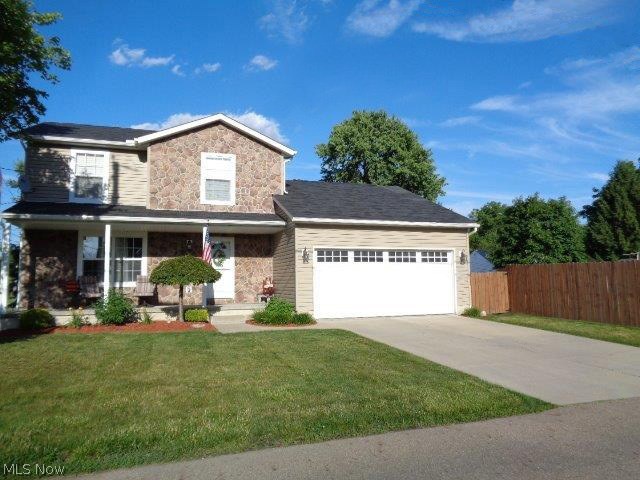 Welcome home to 747 Brewer Ave., Akron, OH 44305! This 11 year young home offers a great place for entertaining. Outside you will enjoy your deck situated in your private fenced in yard. The yard is quite large and is perfect whether your kids have two legs or four. Inside you'll have plenty of space to host family get togethers. This home features a large eat-in kitchen with granite counter tops, family room with sliders to the deck and private yard. Other features include a formal living and recreation area in the basement.