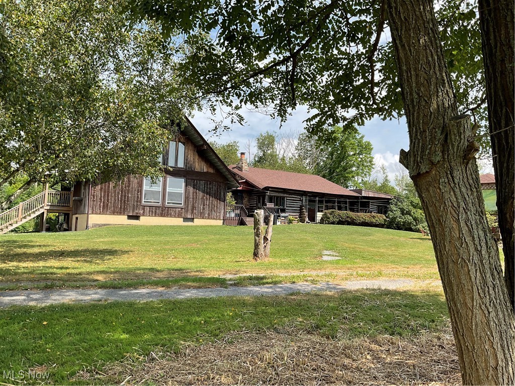 Discover this exceptional property, which encompasses two distinct living spaces—a charming A-frame and a rustic log cabin—nestled on a sprawling 60 acres in a picturesque gentleman's farm area. This enchanting setting is perfect for the aspiring hunter or can serve as an outstanding VRBO rental opportunity.
At the back of the property, the Ashtabula River gracefully flows, offering a tranquil and idyllic backdrop that invites relaxation far from the chaos of urban life, yet conveniently situated just a mile from Route 11 for easy access.
This truly is a rare investment opportunity, rich with potential. While the property may require some tender loving care and updates, the rewards of your efforts will undoubtedly be well worth it. Don’t miss the chance to transform this unique retreat into your dream getaway or a lucrative rental venture.