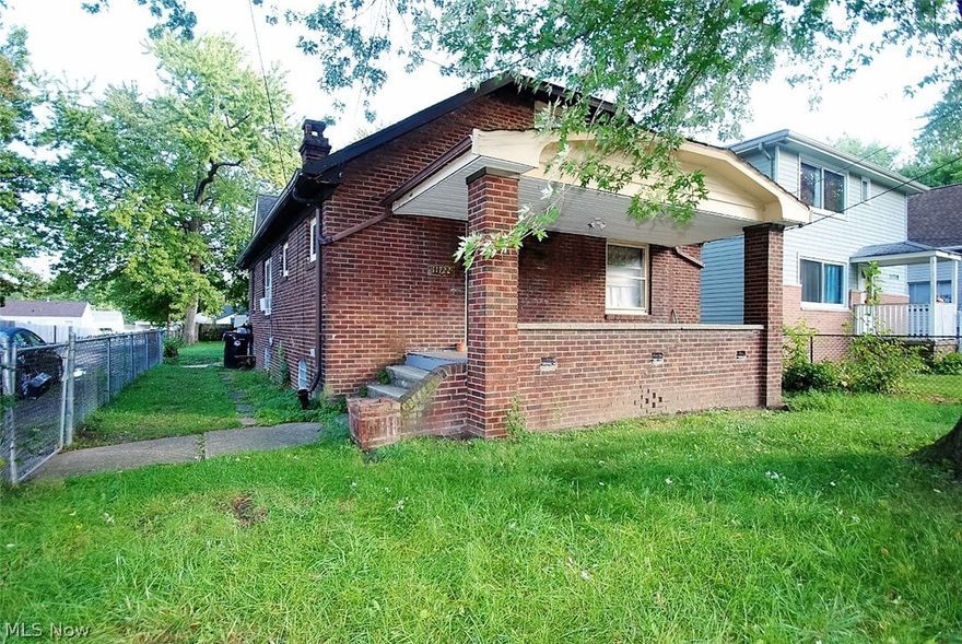 This brick bungalow is situated on a corner lot with a fully fenced in yard. Featuring a front porch, a large back deck (8 x 20 feet), a spacious kitchen, dark stained wood floors, light and bright walls, and a refreshing newly re-done upstairs. Updated/newer: furnace, electric hot water tank, kitchen and bathrooms, new gutters, fresh paint throughout and much more! Easy to show!