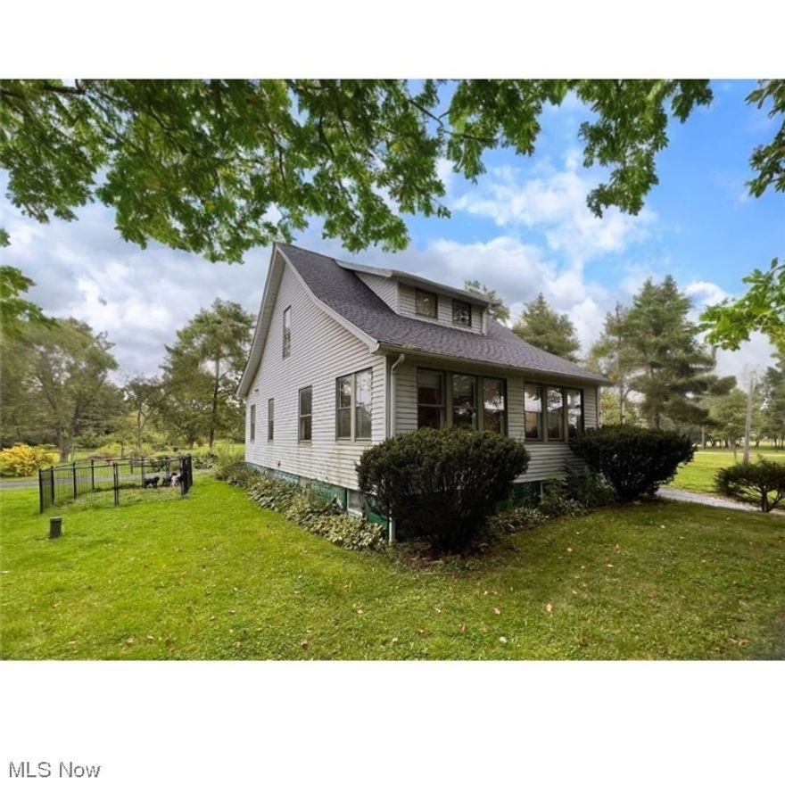 Welcome Home! Take advantage of this unique opportunity, a farm-house on 5.23 acres in Chesterland! This won't last long! 

The home features 3BR & 2BA and boasts a newer roof, as well as newer Hot Water Heater & Furnace. This farmhouse-style home is ready for you to live-in right away or let your imagination run wild -- there is just so much opportunity here. Once you're done daydreaming inside you'll need to really steady yourself for the opportunities that await outside!

The outdoor garage/workshops feature a 2-car garage and carport all with electric and setup for either a wood stove or other heat source. These work spaces provide ample space for all your storage needs. Whether you’re a car enthusiast, a DIYer, or just need extra space for your tools and equipment, these spaces are perfect for you. Did someone say "She-shed" or "Man-cave"?

The 5.23 acres of land provide endless possibilities for relaxation and recreation. Imagine having your own private retreat where you ca