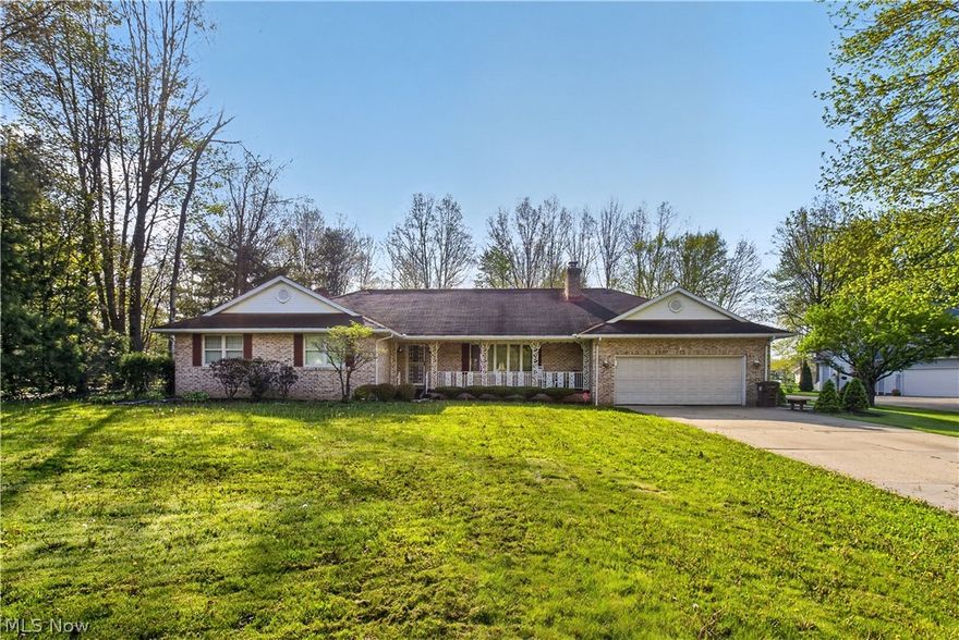 Welcome home to this beautiful and spacious 3 bedroom 2.5 bath ranch home in Champion! There is a 2 car attached garage with an additional 3 car garage behind it with front and rear garage doors. The rear garage measures 26 by 27. Entering the home there is a living room with a fireplace that opens up to the eat in kitchen with an island and ample cabinet space. Formal dining room leads to the Florida room with lots of natural light and can be enjoyed year round. You can walk out on the back patio from the Florida room for outdoor entertaining. This home features a master bedroom with master bathroom, walk in closet and his and hers closets. There are also 2 additional bedrooms and another full bathroom. Heading in from the garage entrance there is a utility room with a laundry area and half bathroom. This utility room also has a door leading to the outside patio in the back yard. There is an expansive full basement that can be finished in any way that fits your needs. New furnace 2024. New refrigerator 2020. This home is a one owner home that has been very well maintained! If you are looking for a home in Champion this is one you don't want to miss! Call for your private showing today!