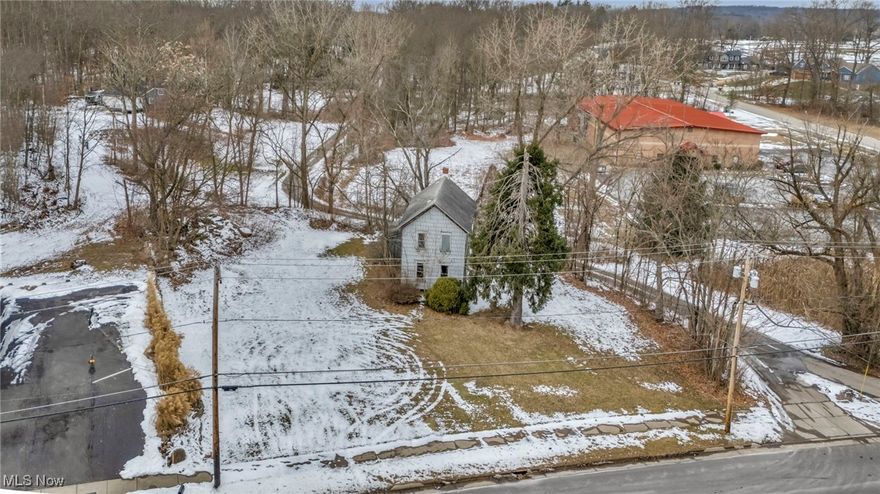 An incredible investment opportunity in the highly desirable Portage Lakes area! This B-1 zoned property is ideal for
future commercial development, with value rooted in the land itself. While a structure exists on-site, it is uninhabitable,
lacks water and electricity, and is not suited for residential use. Currently used for cold storage, the building is secondary
to the prime commercial potential of the land. Portage Lakes is a thriving community known for its boating, waterfront
dining, outdoor recreation, and strong local economy. Its growing commercial presence and increasing demand for
business development make this an excellent investment for those looking to establish or expand in the area. City and
county sewer lines are already in the planning stages, further enhancing its future value. No access to the building at this
time. Don’t miss this rare opportunity to invest in one of Northeast Ohio’s most sought-after commercial locations