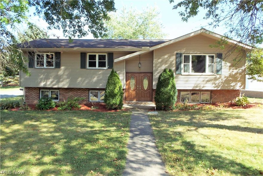 WELCOME HOME - This charming home on a large corner lot has been well maintained and updated and is move-in ready! This home features a large open Living Room with new premium carpet and updated windows. The Kitchen has premium floors, wonderful wood cabinets with plenty of counter space and new appliances that stay. This home has (3) large Bedrooms and (2.5) Bathrooms. The Master Bedroom has a large walk-in closet with built-in storage and there is also a wonderful Master Full Bathroom. This home has a must see Family Room with rustic brick fireplace with vent free gas logs. There is also a Laundry Room with sink and Whirlpool Duet front loading washer and dryer that stay. The bathrooms have been updated with new ceramic floors, corian solid surface counter tops and all new fixtures. Home has a two car garage with windows, electric, hot/cold water, a new garage door opener and new insulated garage door. There is a (10’ x 14’) shed with ramp on a foundation that stays. Home is on a lar