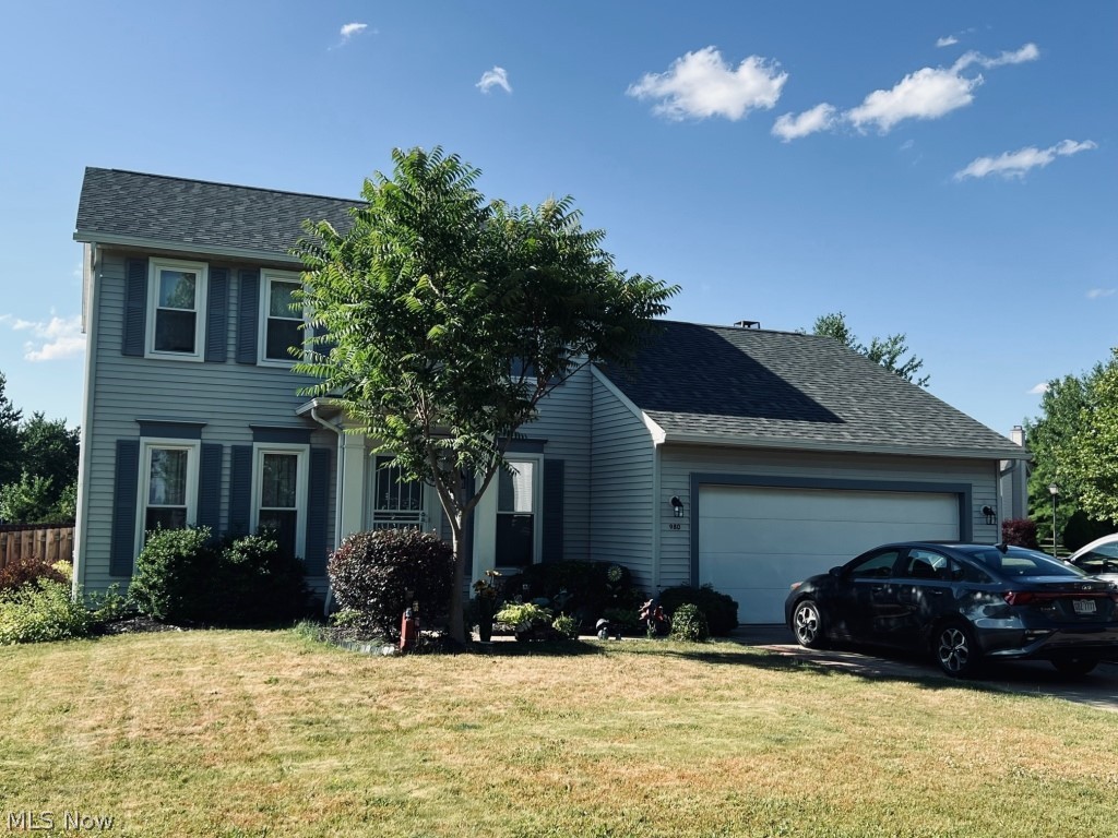 Welcome home to this three bedroom colonial with two full baths and one half bath. First floor laundry also. Vaulted family room and bedroom. Extra large lot includes the open yard to the corner. Spacious deck. Call today!