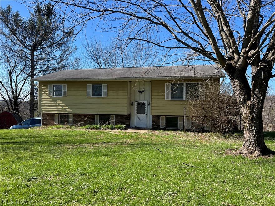 Bring your vision, your contractor, and a little grit--this one is all about potential and return on that sweat equity. 
Set on almost 2 acres, this 3-bedroom, 2-bath home is ready for a full refresh and a new chapter. There is a newer fuel oil furnace 2021, instant hot water hear 2022 and side deck 2025.  The layout is straightforward typical bi-level, the footprint is solid, and the land is the real headline here if you like to be able to spread out, hang out at your firepit--or simply enjoy the space.

Let's be clear: the home needs work. Will need new roof.  The interiors are dated, the carpets have seen better decades, one bedroom is down to the subfloor, walls will need paint, and the lower level is ready for a full rethink.  There is a great view from dining area windows, this would be a great spot for a slider and deck!!  This is not lipstick-and-mascara--it's a renovation opportunity for someone who sees past the current condition and understands the upside

Conveniently located near I-70 and US-22, this property offers convenient access 

If you've been waiting for a project with land, location, and long-term potential--this is it. Investors, renovators, and buyers who aren't afraid of a little elbow grease should take a closer look. Motivated Sellers!