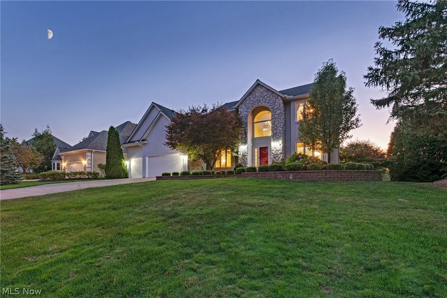 Situated in the desirable Orange Hill Estates community, this immaculately maintained colonial is sure to take your breath away! This home features a gracious floor plan, a stunning kitchen, and a luxurious master suite. As you step inside, you will find a den to your left and the open living/dining room to your right. The kitchen features granite counters with tile backsplash, stainless appliances, a walk-in pantry, an island, and a sunny eat-in area with double doors that open to the large deck. The two-story great room boasts a fireplace and built-ins. A laundry room and a half bath completes the first floor. Upstairs, you will find the master suite, which features two spacious walk-in closets and an en-suite with a vaulted ceiling, a skylight, a step-in shower, a jetted tub, and a double vanity. Three additional bedrooms with spacious closets and a second full bath round off the second floor. The walkout lower level is finished with a family room with patio access, a fifth bedroom