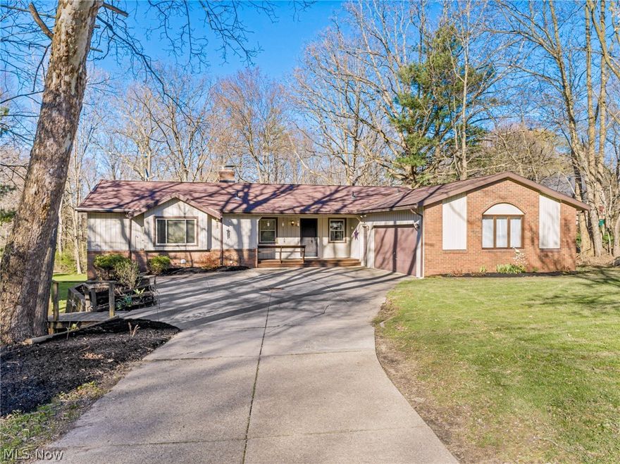 Nearly 2900 sq ft of sunny, welcoming living space in this rare opportunity to own a spacious ranch within walking distance of First & Main! This beautifully maintained home offers floor to ceiling windows on both the main floor and in the fully finished walk-out basement. These windows provide abundant natural light & overlook a park-like, partially wooded lot backing to a golf course which offer gorgeous year-round views. First floor includes an open floor plan between the living room & dining room, both with gleaming hardwood floors. Updated eat-in kitchen with granite counters & stainless steel appliances. First-floor laundry room off the kitchen & garage access with extra storage & deep sink. Large master suite with walk-in closet, bay window & attached master bath. Two good sized bedrooms, a full bath, & loads of closet storage in the hall complete the first floor. The completely updated walk-out lower level offers an additional approx 1300 sq. feet of finished living. A HUGE 15x