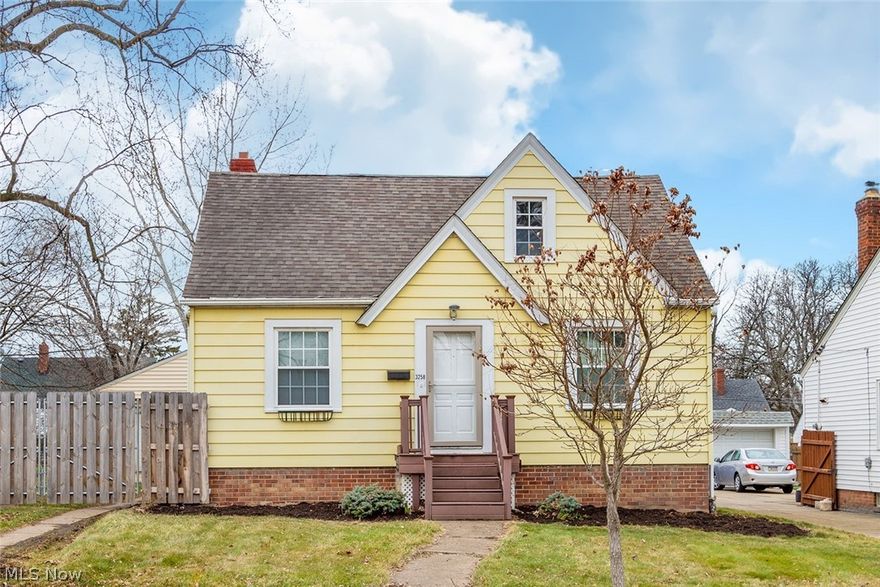 Cute 3BR/1BA Bungalow in a convenient western Cleveland location. Light and bright eat-in Kitchen with access to nice outdoor wood deck. The first floor features nice hardwood floors and two bedrooms and a remodeled bathroom with pedestal sink. The upstairs features a freshly painted large bedroom with double closets. Kitchen appliances and window AC units included. Partially finished basement with glass bock windows. Fully fenced yard great for pets or small children. Newer 2.5 Car Garage with opener. Great Location… walk to RTA station.