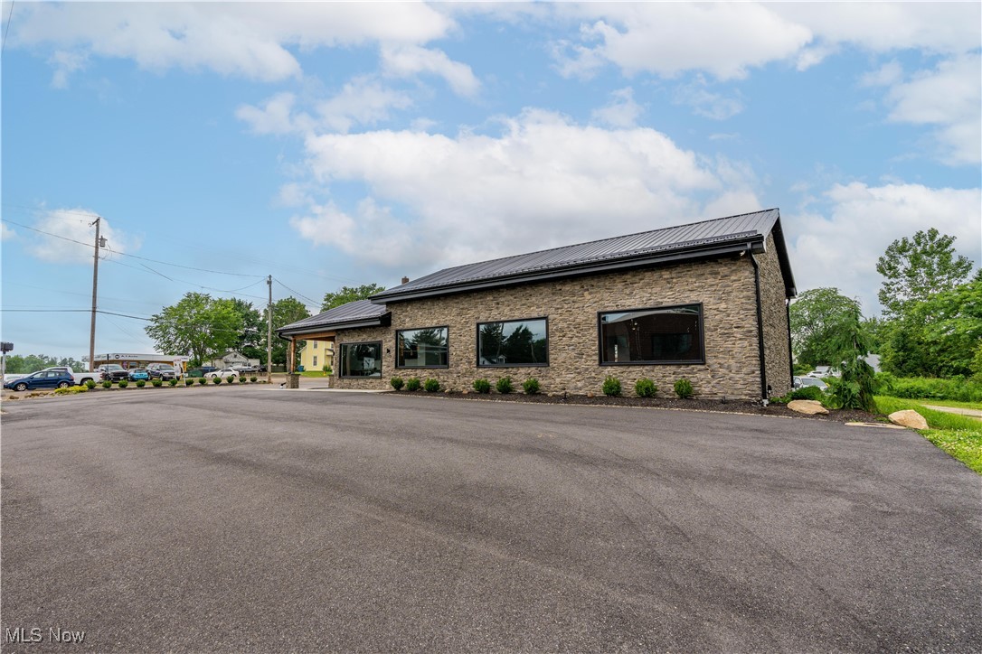 With over 25,000 vehicles traveling on Massillon rd daily this completely renovated commercial space is highly desirable for your business exposure. Currently being used as a showroom with office space this property has been updated from top to bottom. New water and sewer lines as well as fresh pavement, roof, and stone work all done in 2023. This property and location is perfect for your business dream to become a reality! Call today and see what this place has to offer!